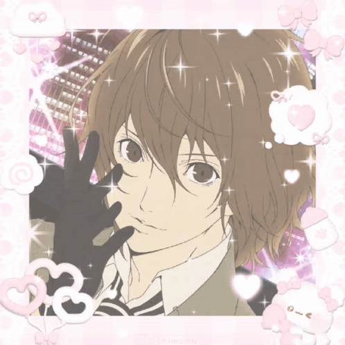 A Picture Of A Boy With Brown Hair And A Black Glove GIF