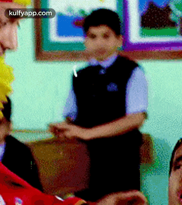 A Picture Of A Boy With The Words Kulfyapp.com On It GIF