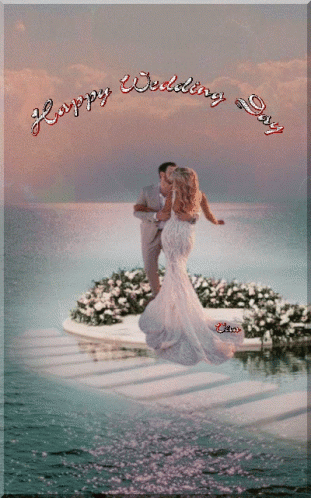 A Picture Of A Bride And Groom With The Words Happy Wedding Day GIF