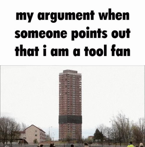A Picture Of A Building Being Demolished With The Words " My Argument When Someone Points Out That I Am A Tool Fan " Bel GIF