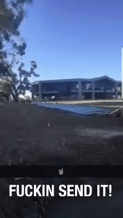A Picture Of A Building With The Words " Fuckin Send It " At The Bottom GIF