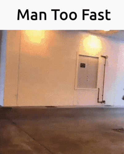 A Picture Of A Building With The Words Man Too Fast GIF