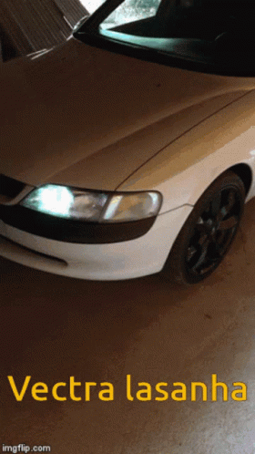 A Picture Of A Car With The Words Vectra Lasanha On It GIF