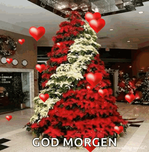 A Picture Of A Christmas Tree With Hearts And The Words God Morgen Written Below It GIF