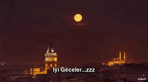 A Picture Of A City At Night With The Words Iyi Geceler Zzz On It GIF