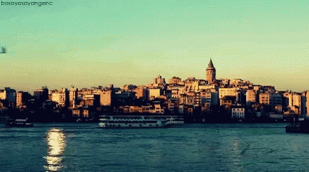 A Picture Of A City With A Boat In The Foreground And The Words Bosahayasayange On The Bottom GIF