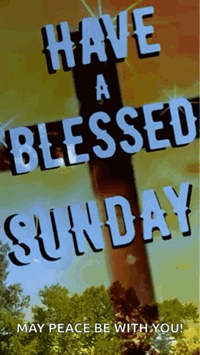 A Picture Of A Cross That Says Have A Blessed Sunday May Peace Be With You GIF