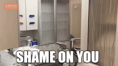 A Picture Of A Dental Office With The Words Shame On You On It GIF