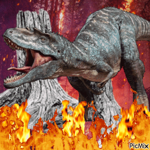 A Picture Of A Dinosaur Surrounded By Flames With Picmix Written On The Bottom GIF