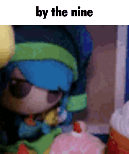A Picture Of A Doll With The Words By The Nine Written On It GIF