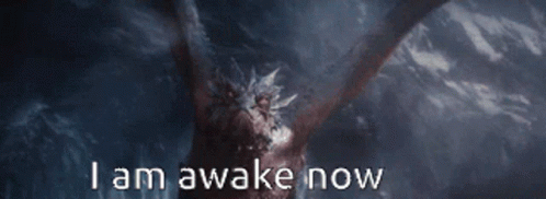 A Picture Of A Dragon With The Words I Am Awake Now Written Below It GIF