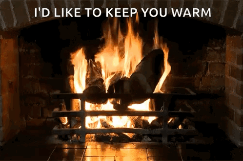 A Picture Of A Fireplace With The Words " I 'D Like To Keep You Warm " Above It GIF