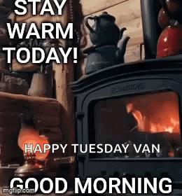 A Picture Of A Fireplace With The Words `` Stay Warm Today ! '' GIF