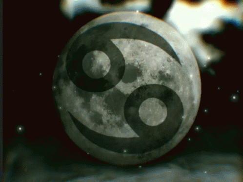 A Picture Of A Full Moon With The Cancer Symbol On It GIF