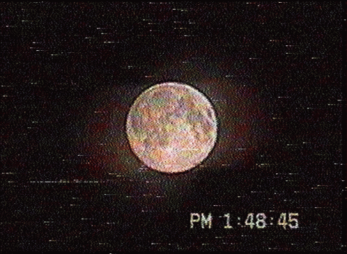 a picture of a full moon with the time 1:48 45