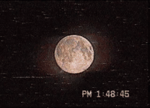 A Picture Of A Full Moon With The Time Of 1:48 45 GIF