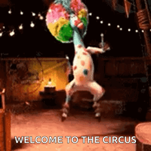 A Picture Of A Giraffe Dancing With The Words Welcome To The Circus GIF