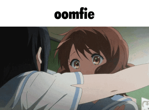 A Picture Of A Girl Hugging Another Girl With A Caption That Says ' Oomfie ' GIF