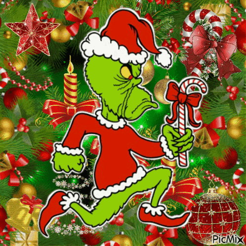 A Picture Of A Grinch Holding A Candy Cane In Front Of A Christmas Tree GIF