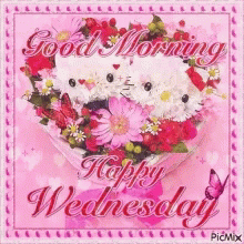 A Picture Of A Heart Shaped Bouquet Of Flowers With The Words Good Morning Happy Wednesday GIF