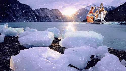 A Picture Of A Lake With A Few Pieces Of Ice On The Shore GIF