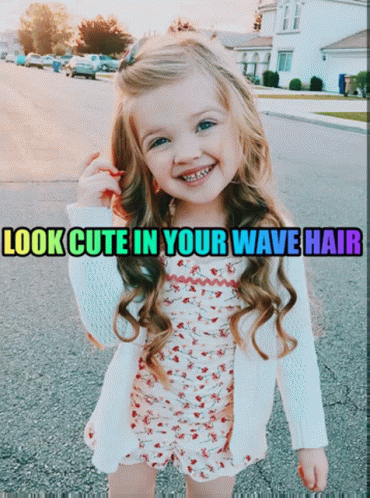 A Picture Of A Little Girl With The Words Look Cute In Your Wave Hair Above Her GIF