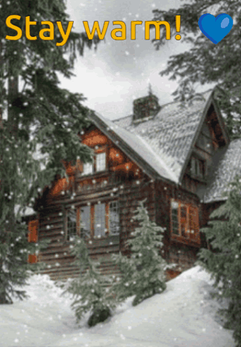 A Picture Of A Log Cabin In The Snow With The Words Stay Warm Above It GIF