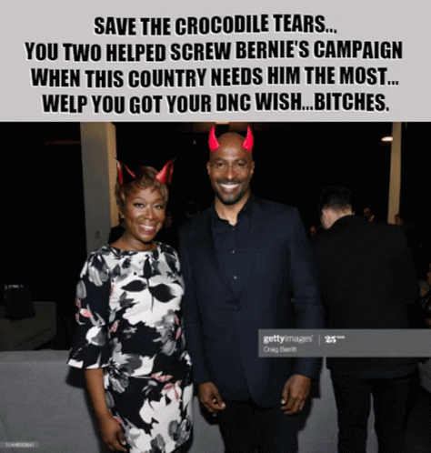 A Picture Of A Man And Woman With Devil Horns On Their Heads GIF