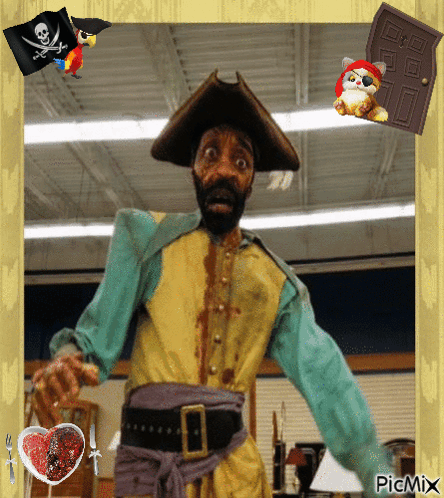 A Picture Of A Man Dressed As A Pirate With A Picture Of A Cat And A Pirate Flag Behind Him GIF