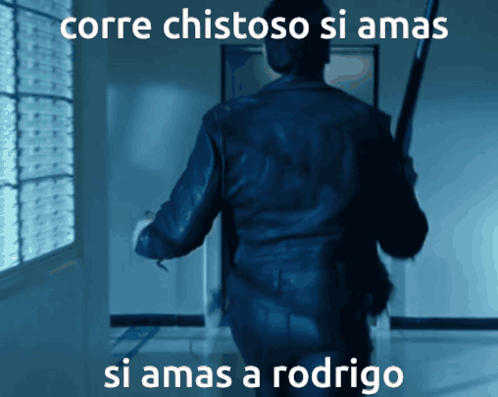 A Picture Of A Man Holding A Gun With The Caption Corre Chistoso Si Ama GIF
