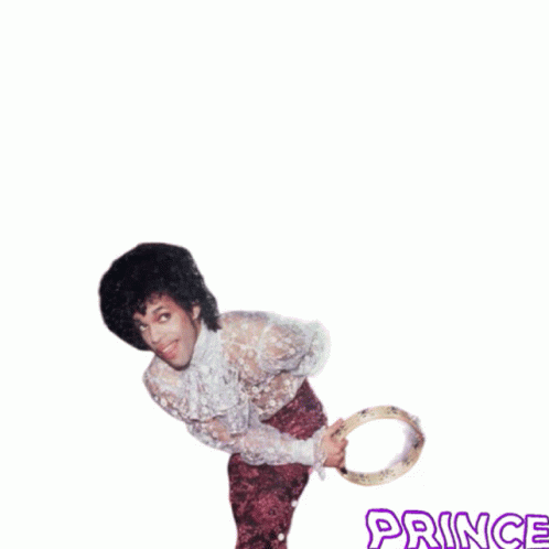 A Picture Of A Man Holding A Tambourine With The Word Prince On The Bottom GIF