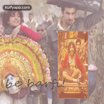 A Picture Of A Man Holding An Umbrella With The Words Be Barfi On The Bottom GIF