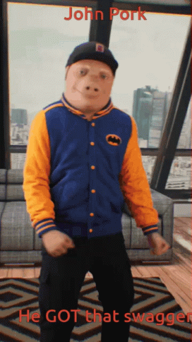 A Picture Of A Man In A Batman Jacket With The Caption John Pork GIF
