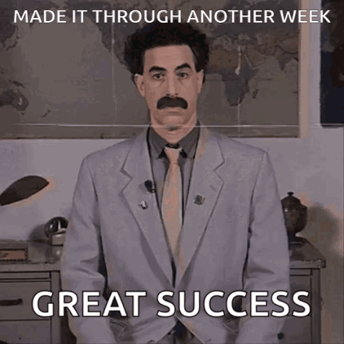 A Picture Of A Man In A Suit And Tie Says Great Success GIF