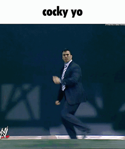 A Picture Of A Man In A Suit And Tie With The Caption Cocky Yo GIF