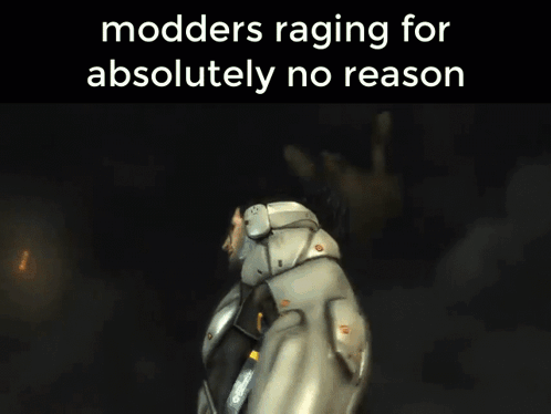 A Picture Of A Man In A Suit With The Words Modders Raging For Absolutely No Reason GIF