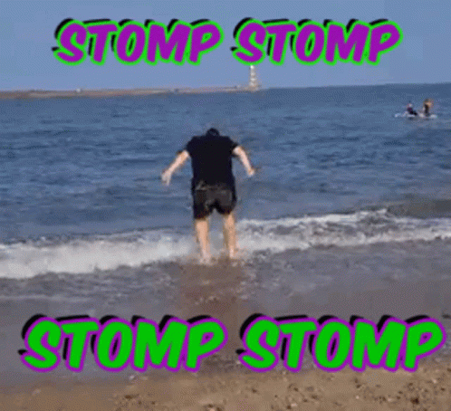 A Picture Of A Man Jumping Into The Ocean With The Words Stomp Stomp On The Bottom GIF
