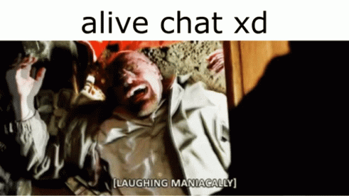 A Picture Of A Man Laying On The Ground With The Caption " Laughing Maniacally " GIF