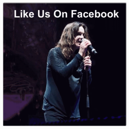 A Picture Of A Man Singing Into A Microphone With The Words Like Us On Facebook Above Him GIF