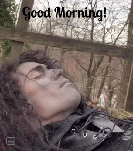 A Picture Of A Man Sleeping With The Words Good Morning GIF