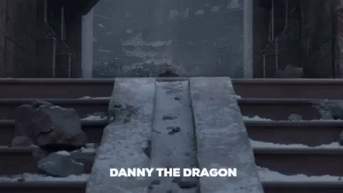 a picture of a man standing in front of a wall with the words dadanny the dragon on the bottom