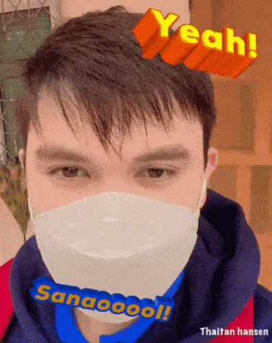 A Picture Of A Man Wearing A Face Mask With Yeah Written On Top GIF