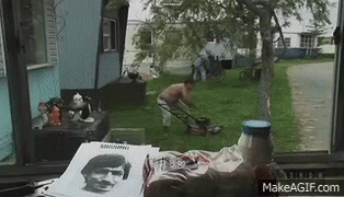 A Picture Of A Man With A Mustache Is On A Table GIF