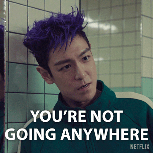 A Picture Of A Man With Purple Hair And The Words You 'Re Not Going Anywhere GIF