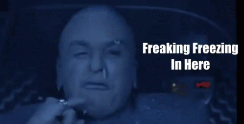 A Picture Of A Man With The Words " Freaking Freezing In Here " On The Bottom GIF