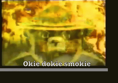 A Picture Of A Man With The Words Okie Dokie Smokie On The Bottom Right GIF