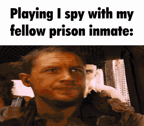 A Picture Of A Man With The Words " Playing I Spy With My Fellow Prison Inmate " GIF
