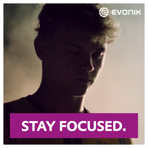 A Picture Of A Man With The Words " Stay Focused " Below It GIF