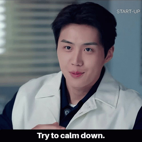 A Picture Of A Man With The Words " Try To Calm Down " On The Bottom GIF