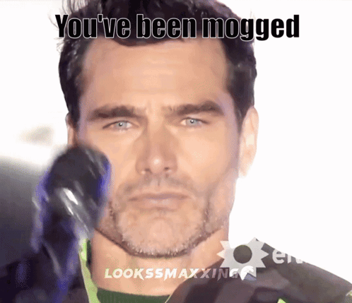 A Picture Of A Man With The Words You 'Ve Been Mogged On The Bottom GIF